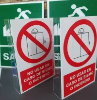 Señales en acrílico doble cara con dobles - no usar ascensor en caso de sismo